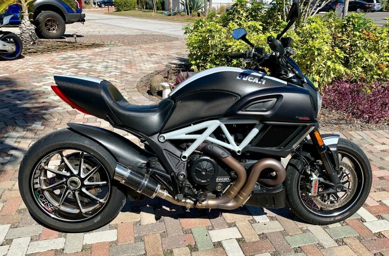 Selling my 2015 Ducati Diavel Carbon in Star White. Image eClassifieds4u